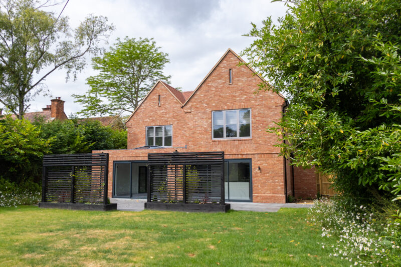 upvc window and door installation brick house with large garden